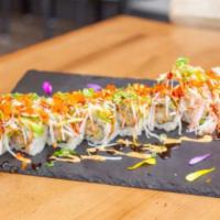 Maroon Roll · Tempura shrimp with cucumber inside topped with avocado, crab meat, tobiko, and scallion.   ...