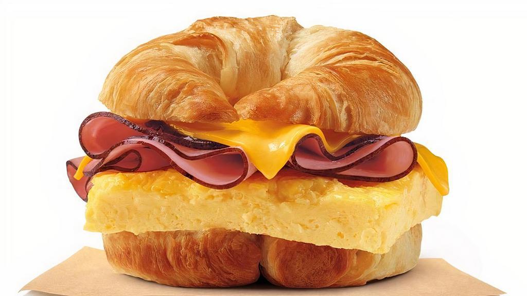 Ham Egg & Cheese Croissan'Wich · Our grab-and-go Ham, Egg & Cheese CROISSAN’WICH® is now made with 100% butter for a soft, flaky croissant piled high with thin sliced sweet black forest ham, fluffy eggs, and melted American cheese.