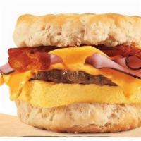 Loaded Biscuit With Sausage Bacon Ham Egg & Cheese · Our Fully Loaded Buttermilk Biscuit is fresh baked for a soft, flaky biscuit piled high with...