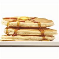 Pancakes · Three warm, fluffy pancakes flavoured with a hint of vanilla and served with syrup.