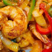 Camarones Fajitas · Prawns sauteed with bell peppers and onions. Guacamole, sour cream.