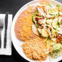 Carnitas De Pollo · Gluten-free. Chicken breast sauteed with bell peppers, zucchini, carrots and onions, served ...
