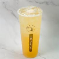 Lychee Green Tea · Lychee fruit, lychee syrup, jasmine green tea.