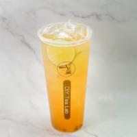 Passion Fruit Green Tea · Passion fruit syrup, lime slices, jasmine green tea.
