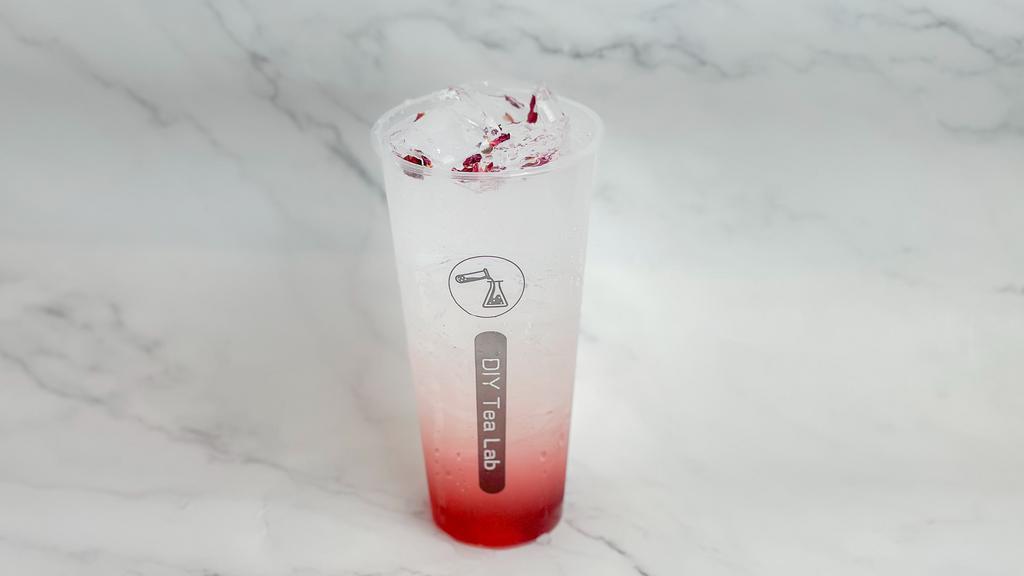 Joanna'S Rose Exilir · rose syrup, 
lychee syrup, 
lemonade, 
sparkling water,
edible rose pedals.