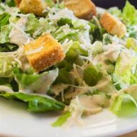 Caesar Salad · Romaine lettuce, house croutons, and Parmesan cheese with Caesar dressing.