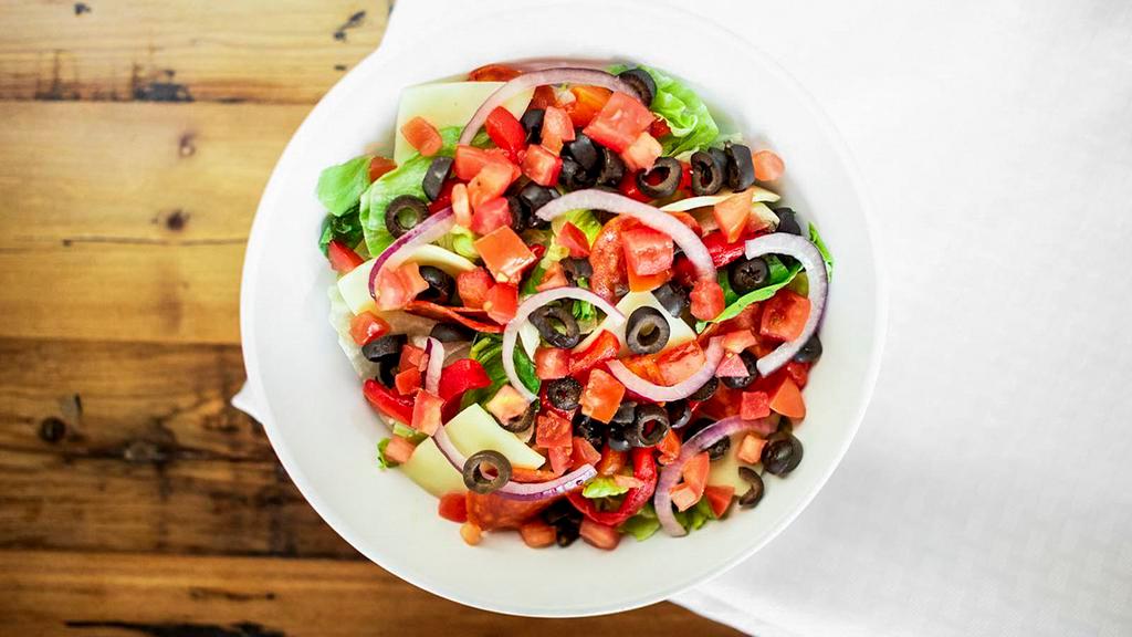 Chopped Tuscan (Small) · Iceberg/Romaine blend, pepperoni, provolone, roasted red peppers, black olives, red onions, roma tomato, champagne vinaigrette.
