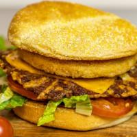 House Burger · Unique combination of one vegan chicken patty and one vegan burger patty topped with vegan c...