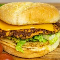 Inside Out Cheese Burger · Plant based patty infused with shredded vegan cheddar cheese and topped with vegan cheddar c...