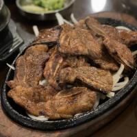 Chok Kalbi · Korean BBQ short ribs marinated in our kalbi sauce.