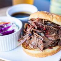 Smoked Bar B-Q Sandwich (Large) · Served on a bun with your choice of meat, one side item and Bar-B-Que sauce.

Choose: beef, ...