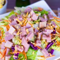 The Big Salad · Smoked Ham or Turkey 
Iceberg lettuce, romaine lettuce, red cabbage, and carrots. 
Comes wit...