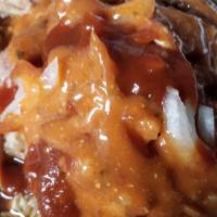 Pulled Pork With Baked Beans · Baked beans top with pulled Pork BBQ sauce and our special Sauce