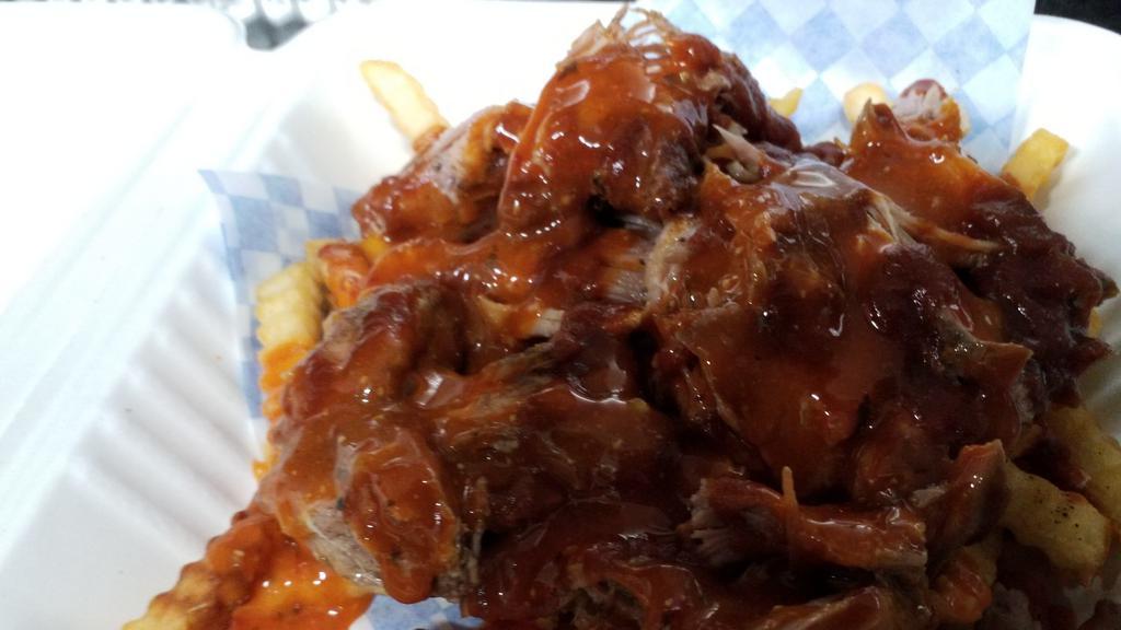 Pulled  Chicken  With  Fries  · Fries  top with pulled chicken, BBQ SAUCE AND SPECIAL SAUCE
