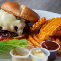 Mushroom And Swiss Burger · Balsalmic Mushrooms and onions are minced and mixed with Gruyere Cheese and added to our bee...