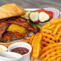 Bacon Cheddar Burger · Bacon, Cheddar and Beef Patty, Topped with Tillamook Cheddar and thick cut pepper bacon.