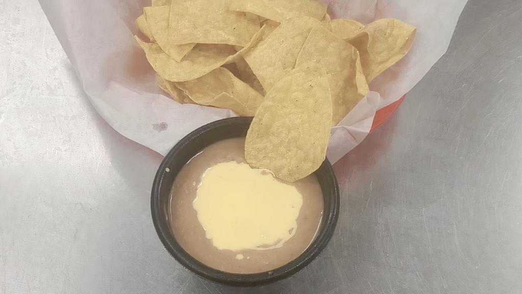 Bean Dip 8Oz/Chips · Home Made Cheese Dip and Refried Beans with Corn Chips on the side