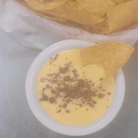Chori Cheese Dip 8Oz/Chips · Home Made Cheese Dip with Chorizo... Corn chips on the side