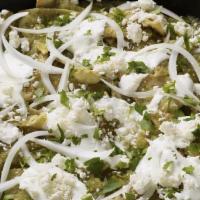Chilaquiles · With your Choice of Red or Green Corn Tortilla Chilaquiles, Served with Rice, Beans, Sour Cr...