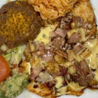 Pollo Hawaiano · Grilled Chicken Breast, Ham and Pineapple smothered with our Home Made Con Queso Sauce (chee...