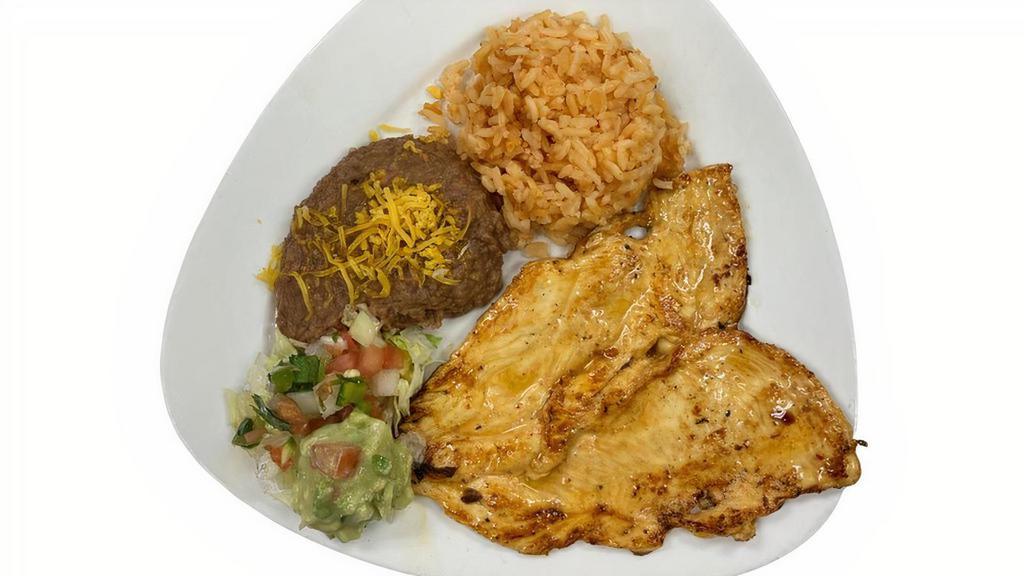 Pollo Asado Combo · Grilled Marinated Chicken Breast served with rice, beans,  Pico de Gallo and Guacamole and your choice of corn or flour tortillas
