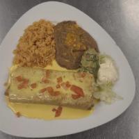 Chimichanga Tex-Mex · Deep fried burrito with beans, cheddar cheese and your choice of Meat inside, topped with ch...