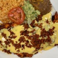 Chori-Pollo · Grilled Adobado Chicken Breast, topped with our Home Mede Chorizo and Con Queso Sauce (Home ...