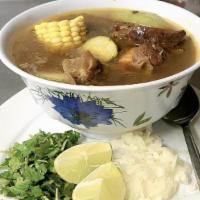 Caldo De Res · Caldo De Res/Beef and Vegetables Soup Jalisco Style served a side of rice, onion, cilantro, ...