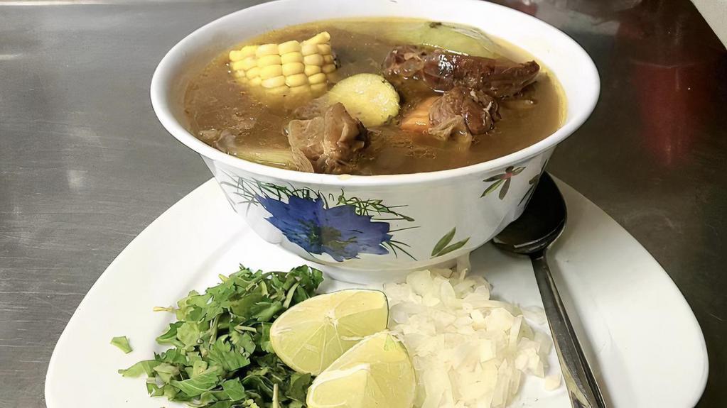 Caldo De Res · Caldo De Res/Beef and Vegetables Soup Jalisco Style served a side of rice, onion, cilantro, lime and Corn Tortillas on the side