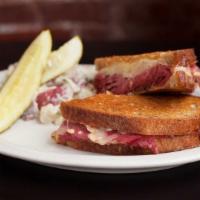 The Classic · Beef pastrami, corned beef or turkey pastrami, grilled on rye with swiss, kraut and Russian ...