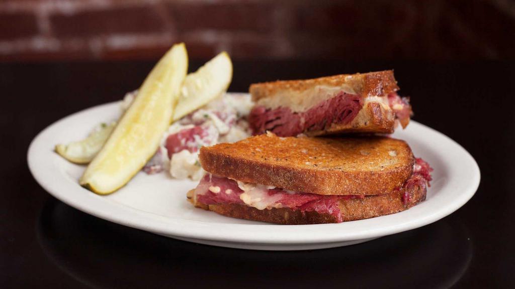 The Classic · Beef pastrami, corned beef or turkey pastrami, grilled on rye with swiss, kraut and Russian dressing.