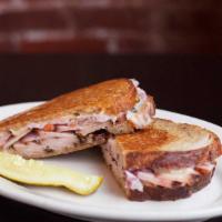 The Rachel · Turkey pastrami with slaw, swiss and Russian.
