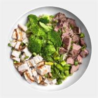 Thai Monster Bowl · Grilled Hormone-Free, Cage-Free Chicken, Certified Angus Beef Steak, Broccoli, Asparagus, Gr...