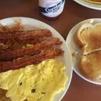 Longshoreman Breakfast · Two scrambled eggs, two bacon or ham or sausage, with hash browns and toast. (6 am to 10 am ...