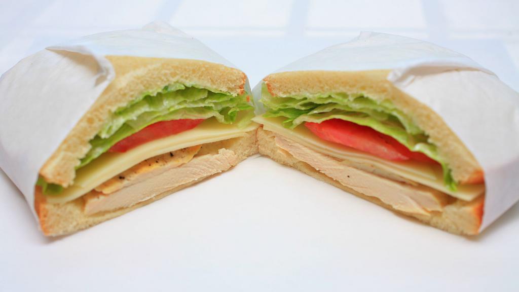 Roasted Chicken · Tender sliced chicken breast, provolone, parmesan, lettuce, tomato and mayo.