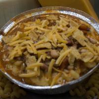 Kidz Chili Mac · Our Classic Mac and Cheese topped with our House Made Chili, Fritos chips, and a 3 Cheddar B...