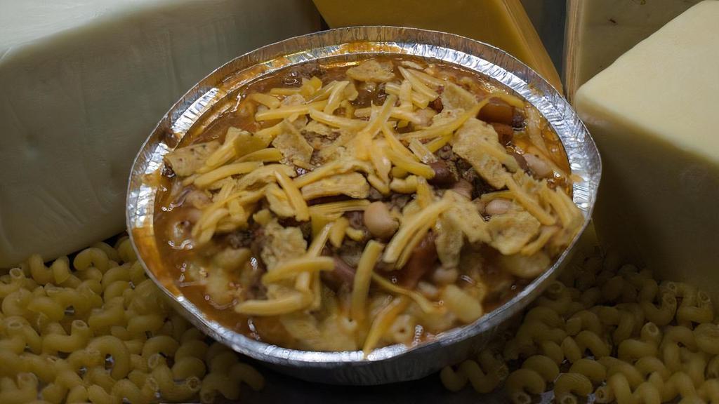 Kidz Chili Mac · Our Classic Mac and Cheese topped with our House Made Chili, Fritos chips, and a 3 Cheddar Blend.