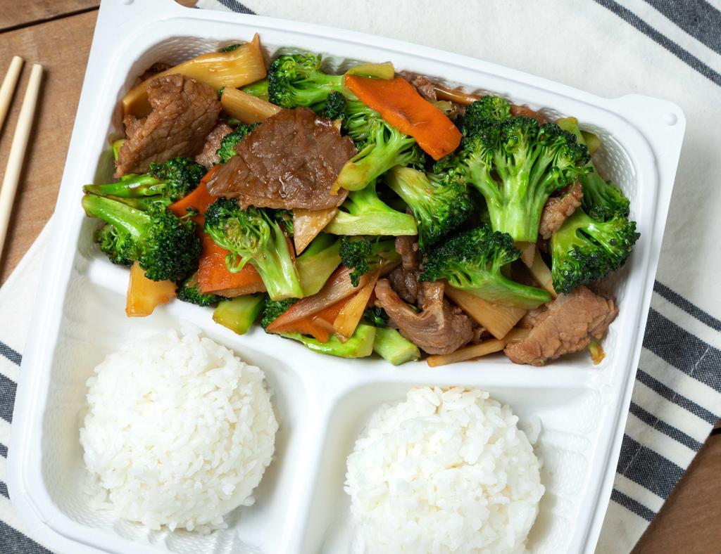 Broccoli Beef · Served with rice.