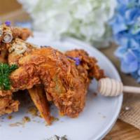Korat Chicken Wings · Deep-fried marinated cut jumbo chicken wings, lemongrass, fried red onion, kaffir lime leaf ...