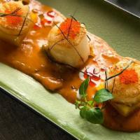 Lava Scallop · Seared scallop with house made curry sauce, coconut milk, shallot, dill, cherry tomato, kaff...