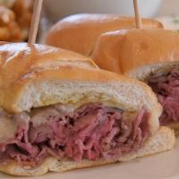 Prime Rib French Dip · thinly sliced fresh prime rib with swiss cheese on a fresh grilled hoagie roll, served any t...