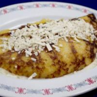 Cachapa Queso · Venezuelan pancake of fresh corn dough stuffed with mozzarella cheese with butter and cotija...