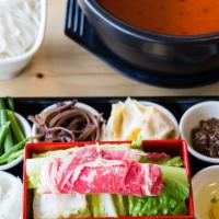 Spicy Rice Noodles/麻辣米线 · Spicy soup base with rice noodles and many small side dishes