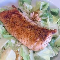Caesar · Romaine lettuce, lemon Caesar dressing 
Add chicken or salmon for an additional charge.