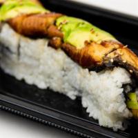 Dragon Roll · Shrimp tempura, crab mix, and cucumber, topped with baked . fresh water eel, avocado, and ee...