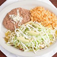 Enchiladas · Red or green with rice and beans.