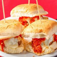 Meatball Sliders · Our homemade Italian meatballs and gravy served on Italian bread with melted mozzarella chee...