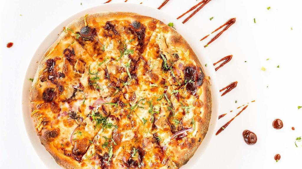 Bbq Style Chicken · BBQ sauce, mozzarella cheese, roasted chicken, red onions, cilantro and BBQ sauce.