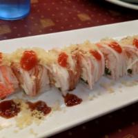 Angel Roll · 2 tempura shrimp, jalapeno, cheese, inside, pink soy paper, crabmeat on top, spicy eel sauce...