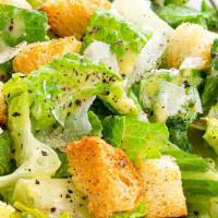 Caesar Salad · Lettuce, croutons, shredded cheese tossed in our caesar dressing.
